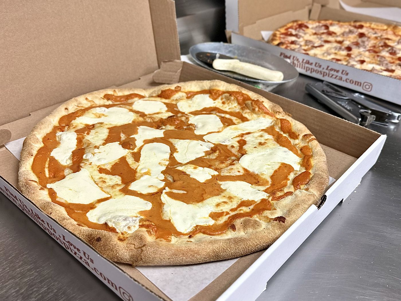 Fresh margherita pizza with mozzarella from Phillippo's